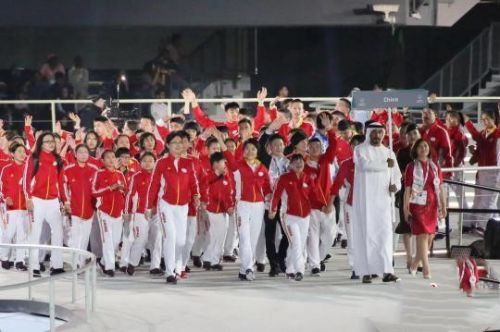 当地时间3月14日晚，第十五届世界夏季特殊奥林匹克运动会在阿联酋首都阿布扎比开幕。图为中国代表团入场。　徐俊星 摄