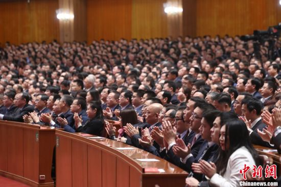 12月18日，庆祝改革开放40周年大会在北京人民大会堂隆重举行。中新社记者