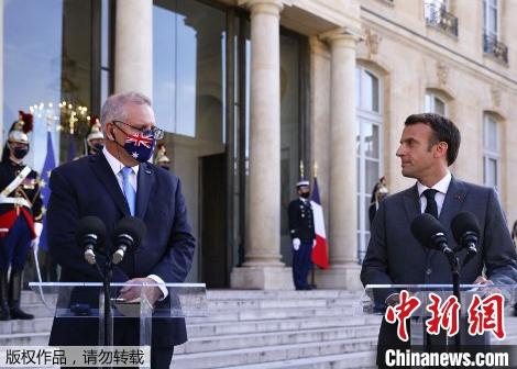 资料图：澳大利亚总理莫里森(左)和法国总统马克龙。